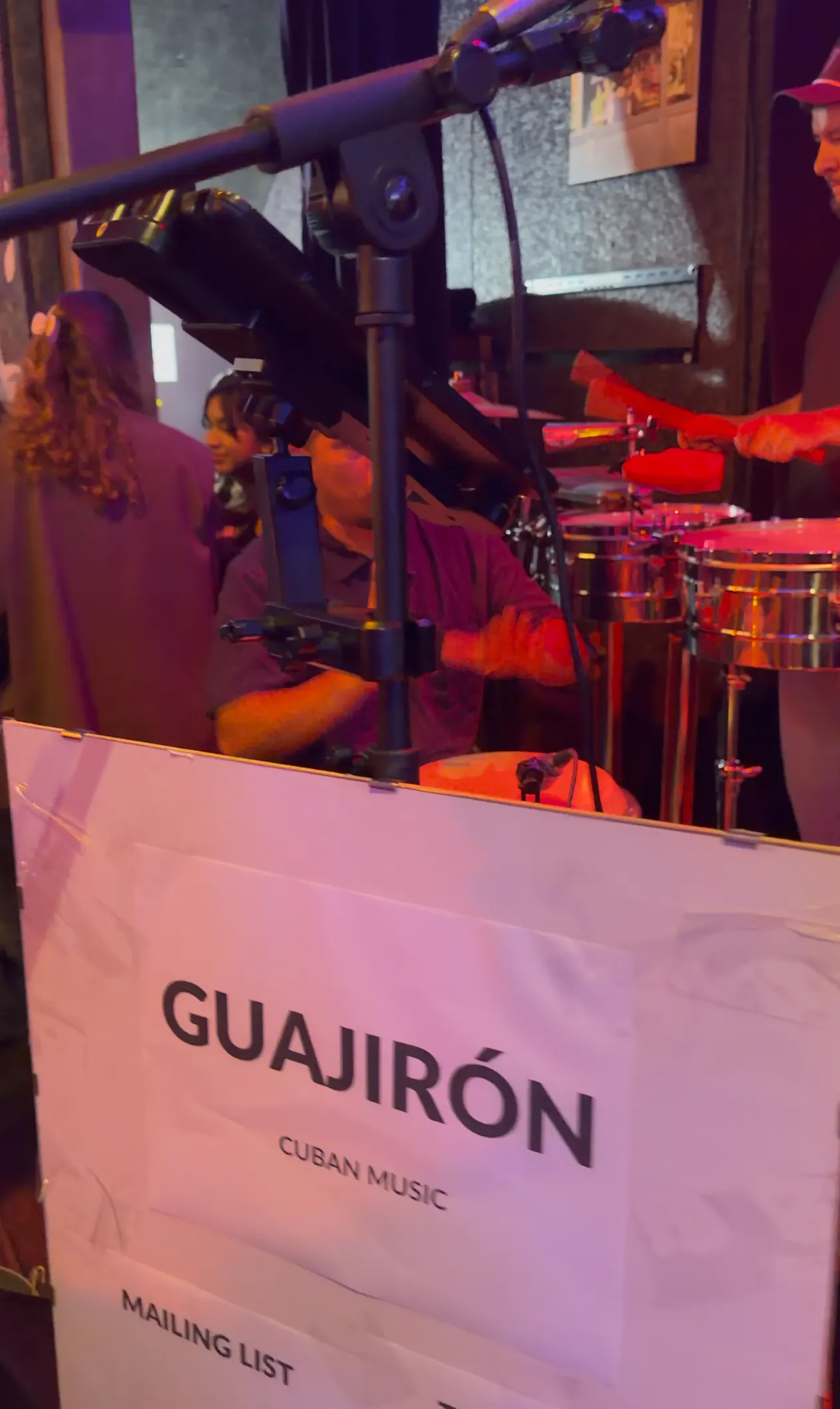 Guajirón percussionists playing behind their music stands